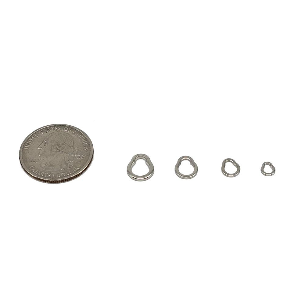 Decoy R-6 GP Solid Rings 12-Pack - size comparison with coin