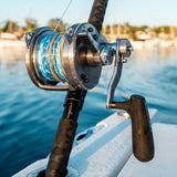 Daiwa Saltiga Lever Drag 80 2-Speed reel on a rod in a boat rod holder