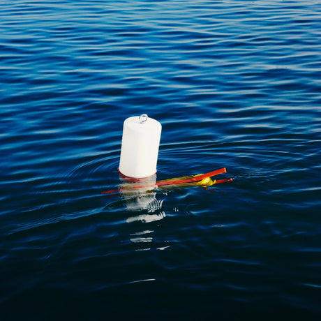 Glow Buoy float on the water in daylight